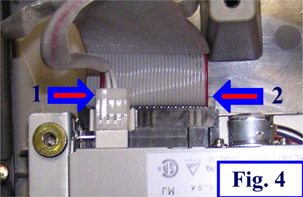 fig 4 - unplogging floppy cables