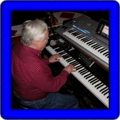 Photo of Mark at keyboard